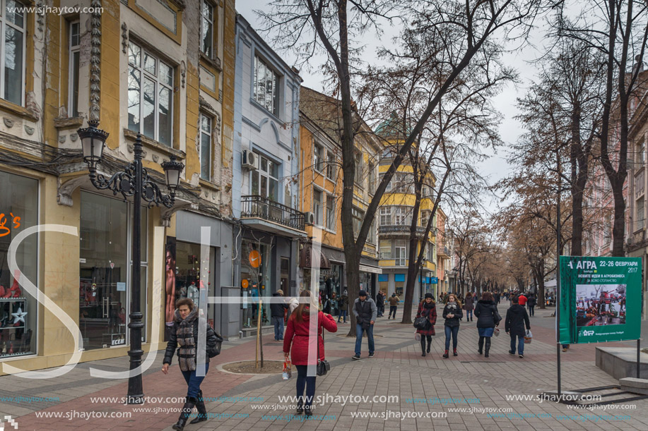 PLOVDIV, BULGARIA - DECEMBER 30, 2016:  Walking people and Houses at central street in city of Plovdiv, Bulgaria