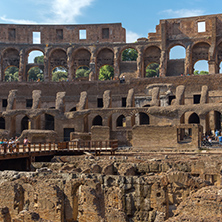 ROME, ITALY - JUNE 24, 2017: Tourists visiting inside part of  Colosseum in city of Rome, Italy