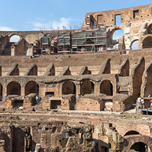 ROME, ITALY - JUNE 24, 2017: Tourists visiting inside part of  Colosseum in city of Rome, Italy