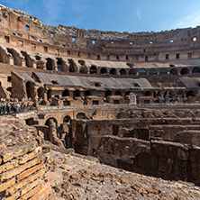 ROME, ITALY - JUNE 24, 2017: Tourists visiting inside part of  Colosseum in city of Rome, Italy