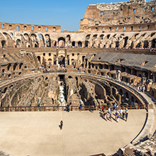ROME, ITALY - JUNE 24, 2017: Tourists visiting inside part of  Colosseum in city of Rome, Italy