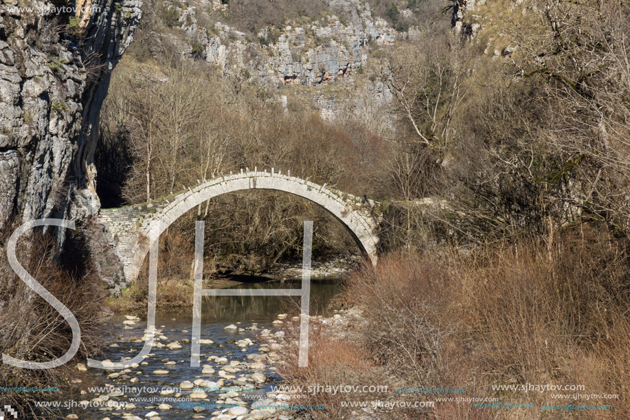 Amazing landscape of Bridge of Kontodimos or Lazaridis in Vikos gorge and Pindus Mountains, Zagori, Epirus, Greece