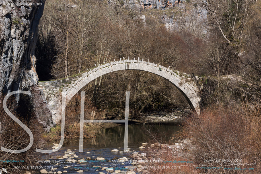 Amazing landscape of Bridge of Kontodimos or Lazaridis in Vikos gorge and Pindus Mountains, Zagori, Epirus, Greece