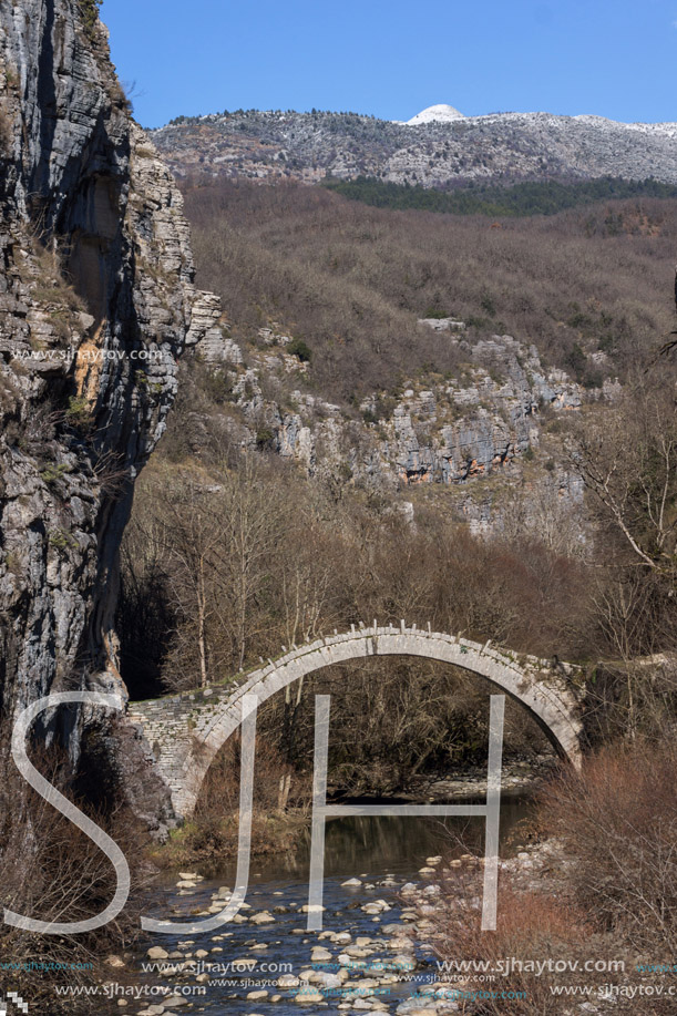 Amazing landscape of Bridge of Kontodimos or Lazaridis in Vikos gorge and Pindus Mountains, Zagori, Epirus, Greece