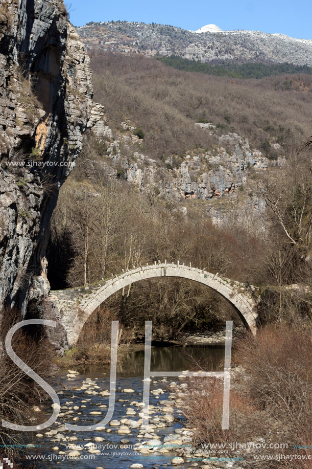 Amazing landscape of Bridge of Kontodimos or Lazaridis in Vikos gorge and Pindus Mountains, Zagori, Epirus, Greece