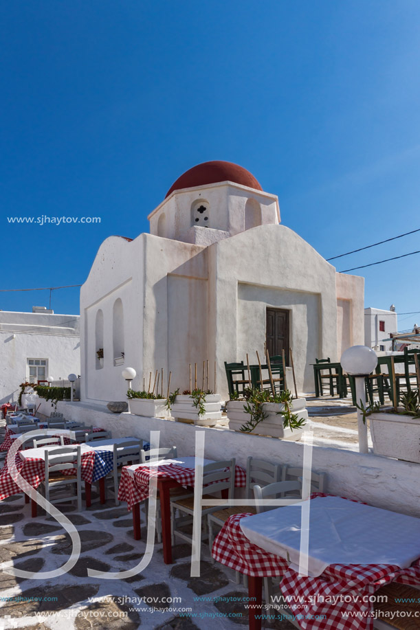 MYKONOS, GREECE - MAY 1, 2013: White orthodox church and small bell tower in Mykonos, Cyclades Islands, Greece