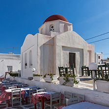 MYKONOS, GREECE - MAY 1, 2013: White orthodox church and small bell tower in Mykonos, Cyclades Islands, Greece