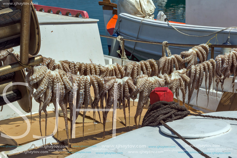 PAROS, GREECE - MAY 3, 2013: Boats at the port of Naoussa town, Paros island, Cyclades, Greece