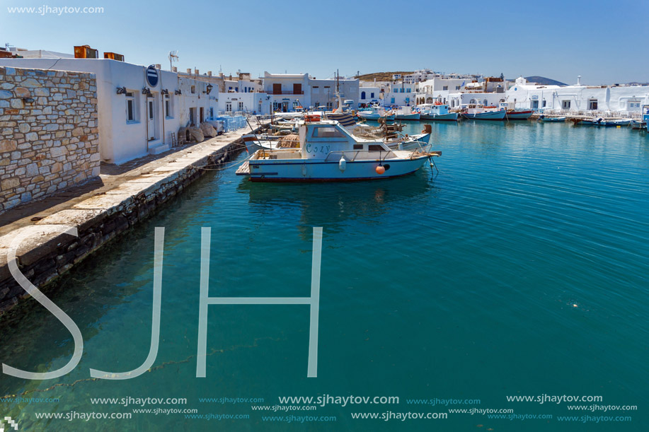 PAROS, GREECE - MAY 3, 2013: Boats at the port of Naoussa town, Paros island, Cyclades, Greece