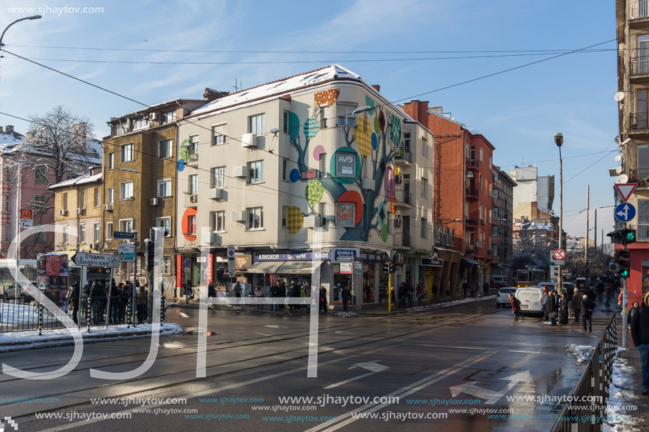 SOFIA, BULGARIA - NOVEMBER 29, 2017: People and tram at Graf Ignatiev street in Sofia, Bulgaria