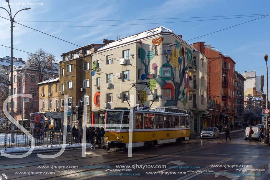 SOFIA, BULGARIA - NOVEMBER 29, 2017: People and tram at Graf Ignatiev street in Sofia, Bulgaria