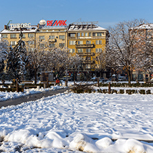 SOFIA, BULGARIA - NOVEMBER 29, 2017: Winter view of Walking people on park in front of  National Palace of Culture in Sofia, Bulgaria