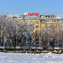 SOFIA, BULGARIA - NOVEMBER 29, 2017: Winter view of Walking people on park in front of  National Palace of Culture in Sofia, Bulgaria