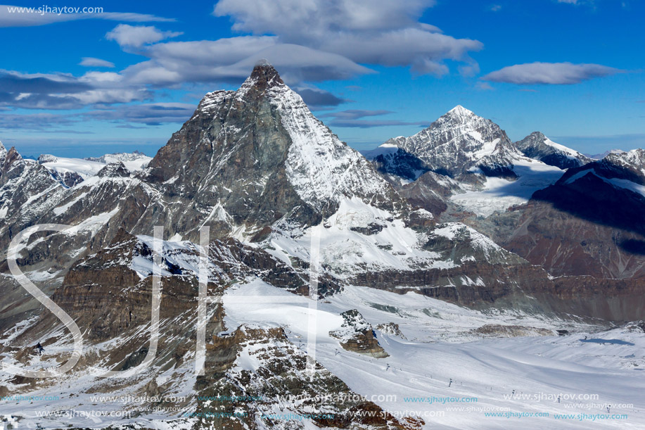 Winter panorama of mount Matterhorn covered with clouds, Canton of Valais, Alps, Switzerland