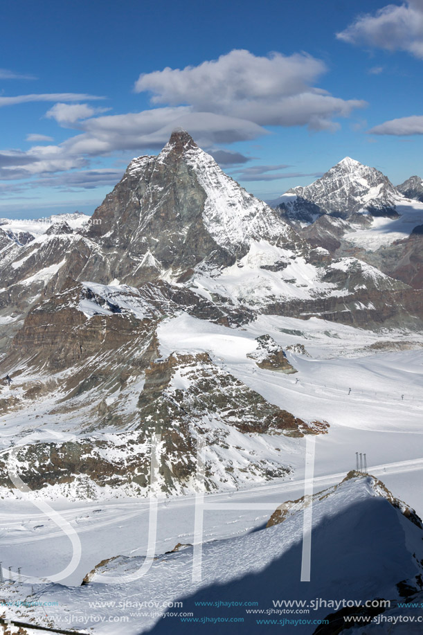 Winter panorama of mount Matterhorn covered with clouds, Canton of Valais, Alps, Switzerland