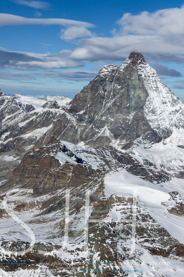 Winter panorama of mount Matterhorn covered with clouds, Canton of Valais, Alps, Switzerland