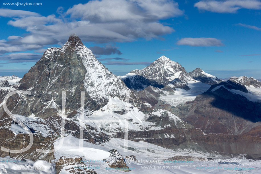 Winter panorama of mount Matterhorn covered with clouds, Canton of Valais, Alps, Switzerland