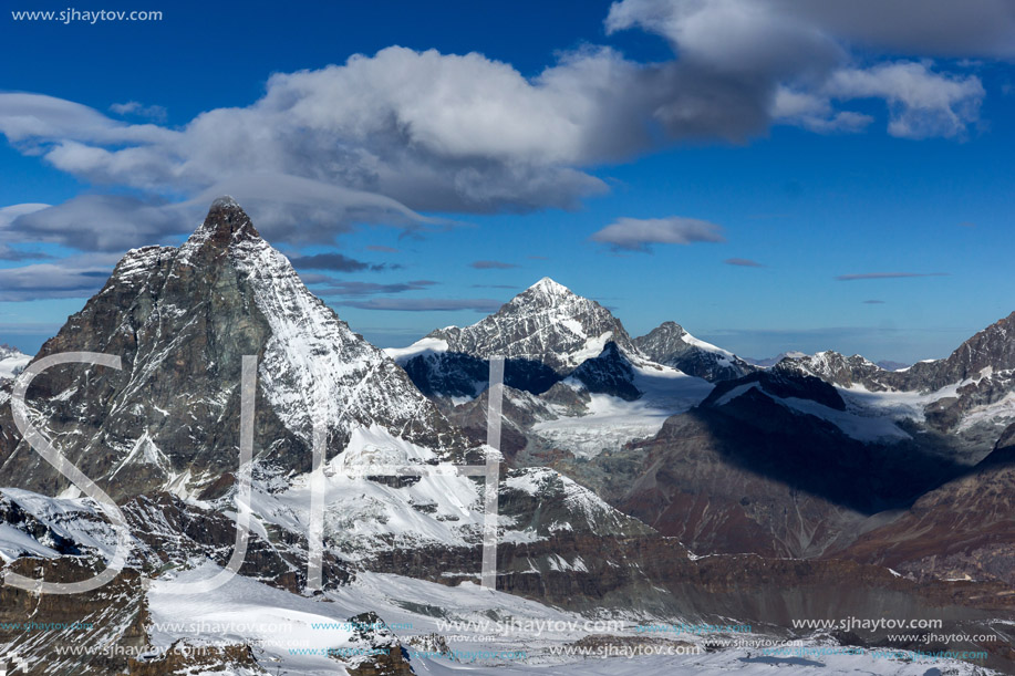 Winter panorama of mount Matterhorn covered with clouds, Canton of Valais, Alps, Switzerland