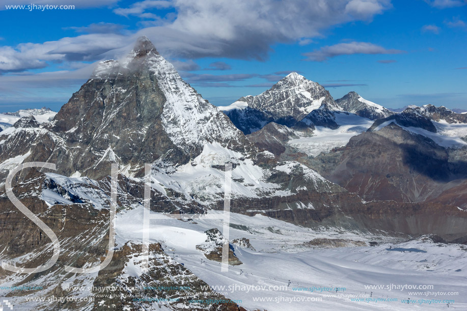 Winter panorama of mount Matterhorn covered with clouds, Canton of Valais, Alps, Switzerland