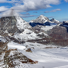 Winter panorama of mount Matterhorn covered with clouds, Canton of Valais, Alps, Switzerland