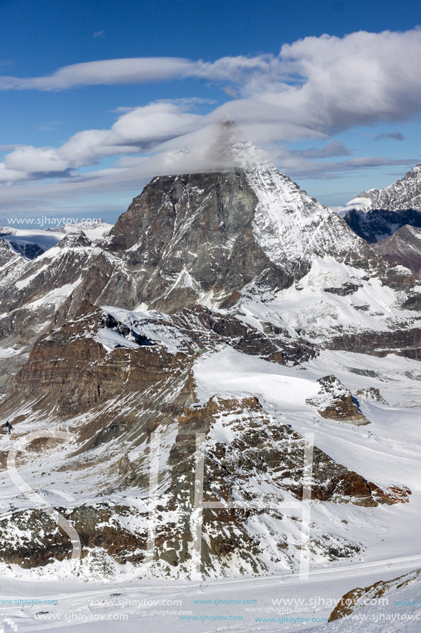 Winter panorama of mount Matterhorn covered with clouds, Canton of Valais, Alps, Switzerland