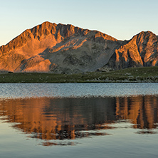 Sunset landscape with Kamenitsa peak and Tevno lake, Pirin Mountain, Bulgaria