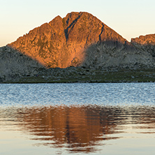 Sunset landscape with Kamenitsa peak and Tevno lake, Pirin Mountain, Bulgaria