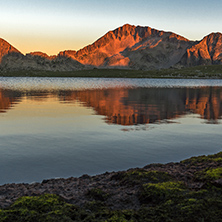 Sunset landscape with Kamenitsa peak and Tevno lake, Pirin Mountain, Bulgaria