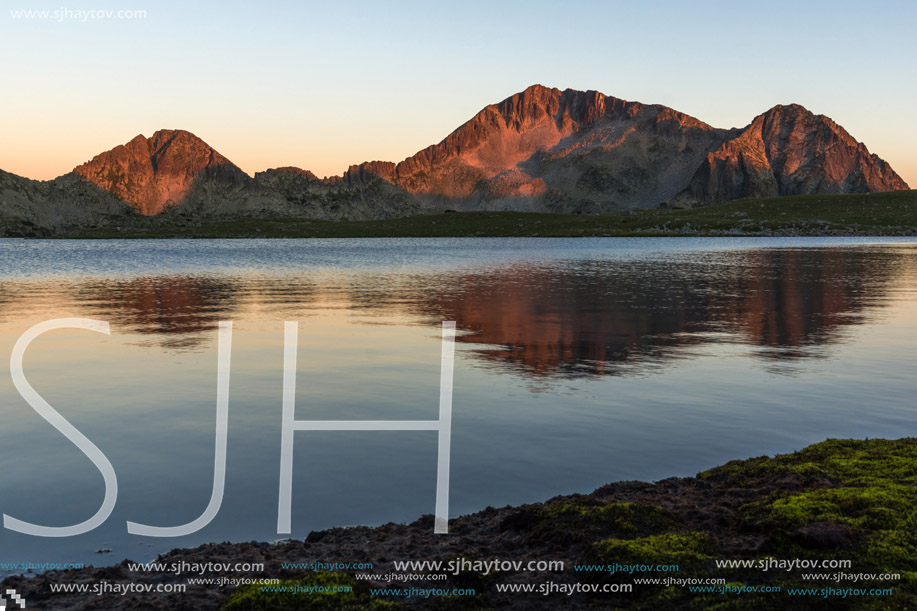 Sunset landscape with Kamenitsa peak and Tevno lake, Pirin Mountain, Bulgaria