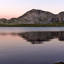 Sunset landscape with Kamenitsa peak and Tevno lake, Pirin Mountain, Bulgaria