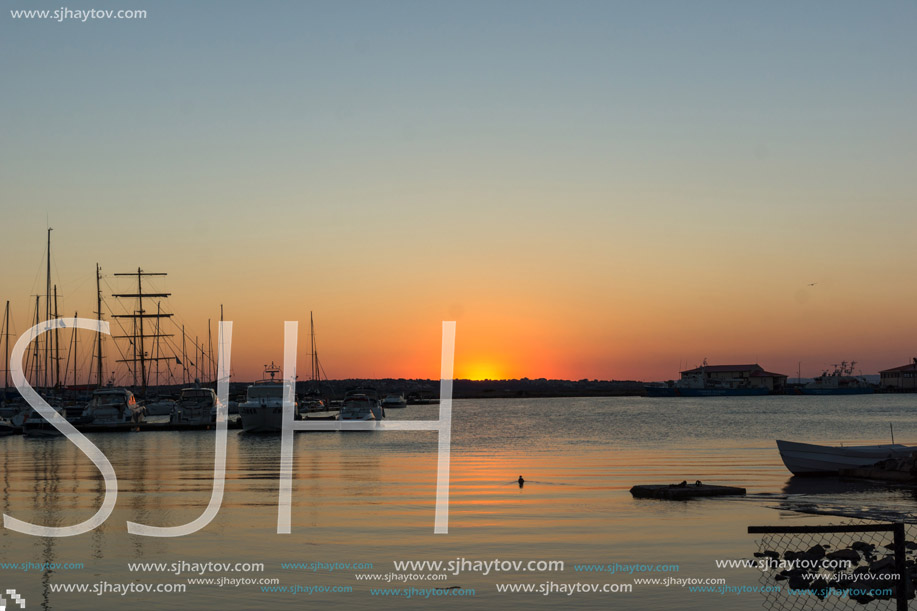 SOZOPOL, BULGARIA - JULY 11, 2016: Amazing Sunset at the port of Sozopol, Burgas Region, Bulgaria