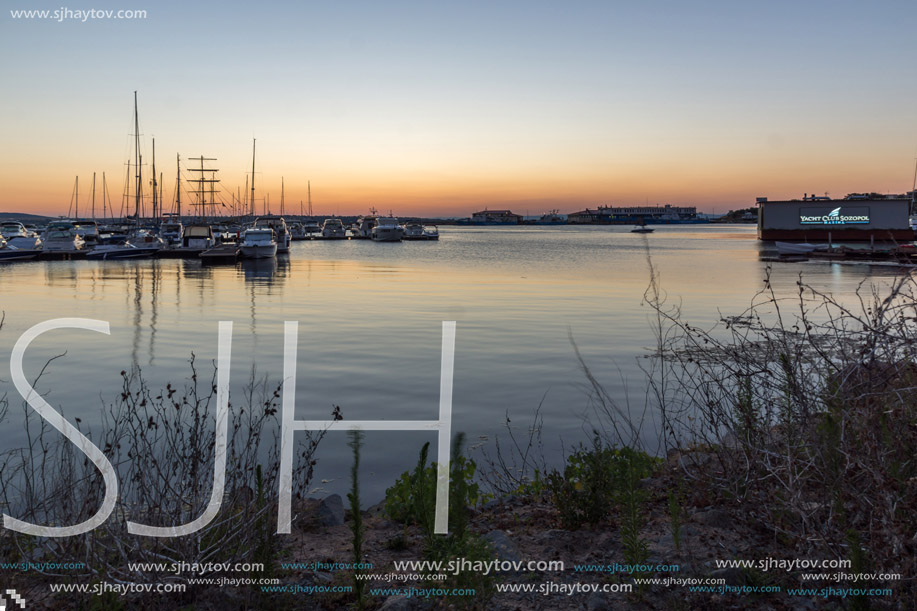 SOZOPOL, BULGARIA - JULY 11, 2016: Amazing Sunset at the port of Sozopol, Burgas Region, Bulgaria