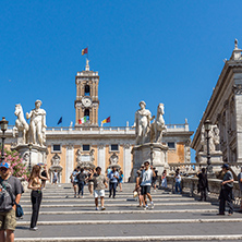 ROME, ITALY - JUNE 23, 2017: Statue and Flowers in front of Capitoline Museums in city of Rome, Italy