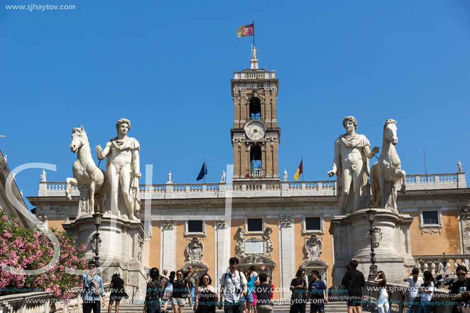 ROME, ITALY - JUNE 23, 2017: Statue and Flowers in front of Capitoline Museums in city of Rome, Italy