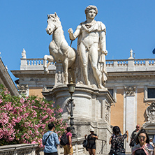 ROME, ITALY - JUNE 23, 2017: Statue and Flowers in front of Capitoline Museums in city of Rome, Italy