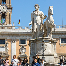 ROME, ITALY - JUNE 23, 2017: Statue and Flowers in front of Capitoline Museums in city of Rome, Italy