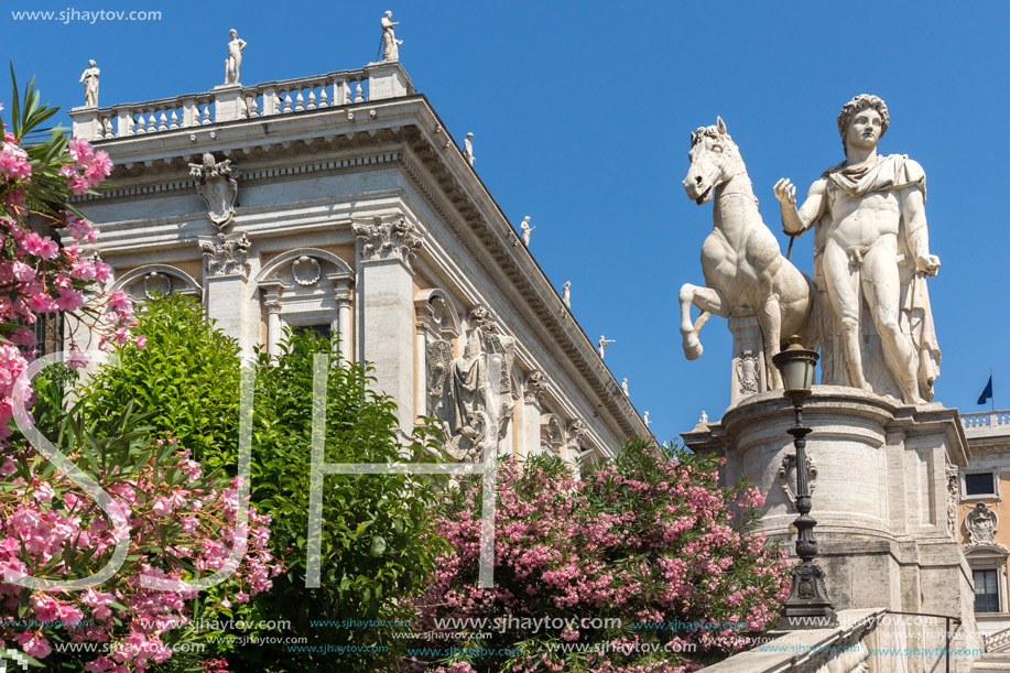ROME, ITALY - JUNE 23, 2017: Statue and Flowers in front of Capitoline Museums in city of Rome, Italy