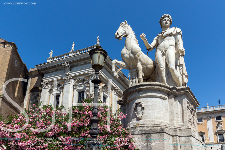 ROME, ITALY - JUNE 23, 2017: Statue and Flowers in front of Capitoline Museums in city of Rome, Italy