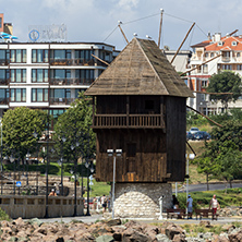 NESSEBAR, BULGARIA - 30 JULY 2014: Old Wooden windmill and panorama to town of Nessebar, Burgas Region, Bulgaria