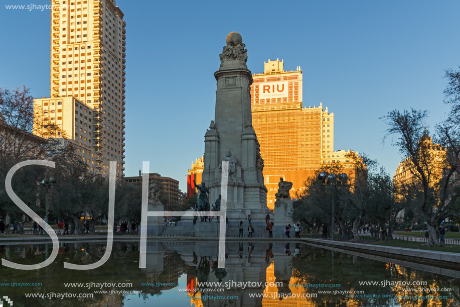 MADRID, SPAIN - JANUARY 21, 2018:  Sunset view of Monument to Cervantes and Don Quixote and Sancho Panza at Spain Square in City of Madrid, Spain