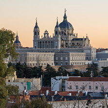 MADRID, SPAIN - JANUARY 21, 2018:  Sunset view of Royal Palace and Almudena Cathedral in City of Madrid, Spain