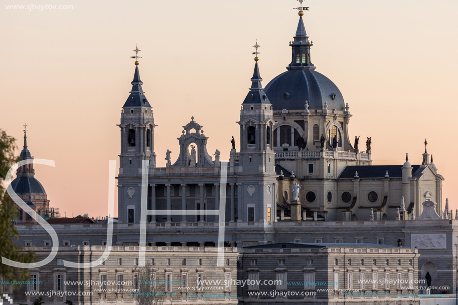 MADRID, SPAIN - JANUARY 21, 2018:  Sunset view of Royal Palace and Almudena Cathedral in City of Madrid, Spain