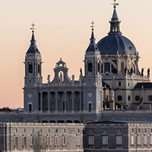 MADRID, SPAIN - JANUARY 21, 2018:  Sunset view of Royal Palace and Almudena Cathedral in City of Madrid, Spain