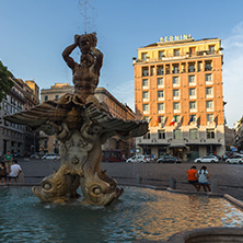 ROME, ITALY - JUNE 24, 2017: Sunset view of Triton Fountain at Piazza Barberini in Rome, Italy