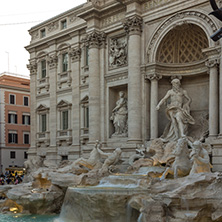 ROME, ITALY - JUNE 24, 2017: Sunset view of People visiting Trevi Fountain (Fontana di Trevi) in city of Rome, Italy