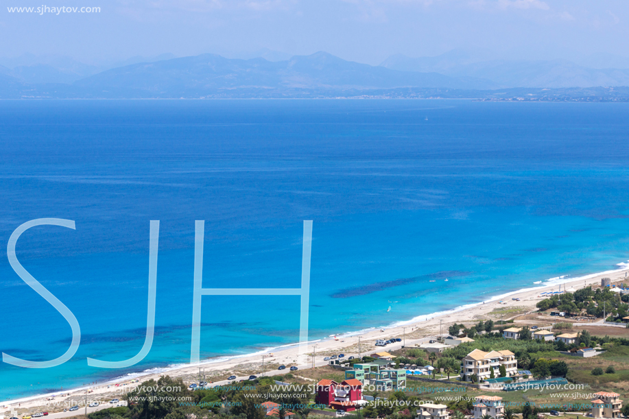 Panoramic view of Agios Ioanis beach with blue waters, Lefkada, Ionian Islands, Greece