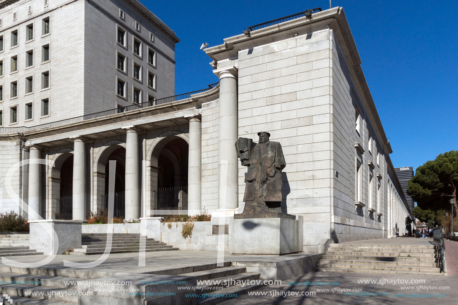 MADRID, SPAIN - JANUARY 21, 2018:  Building and monument in front of Ministry of Employment and Social Security in City of Madrid, Spain