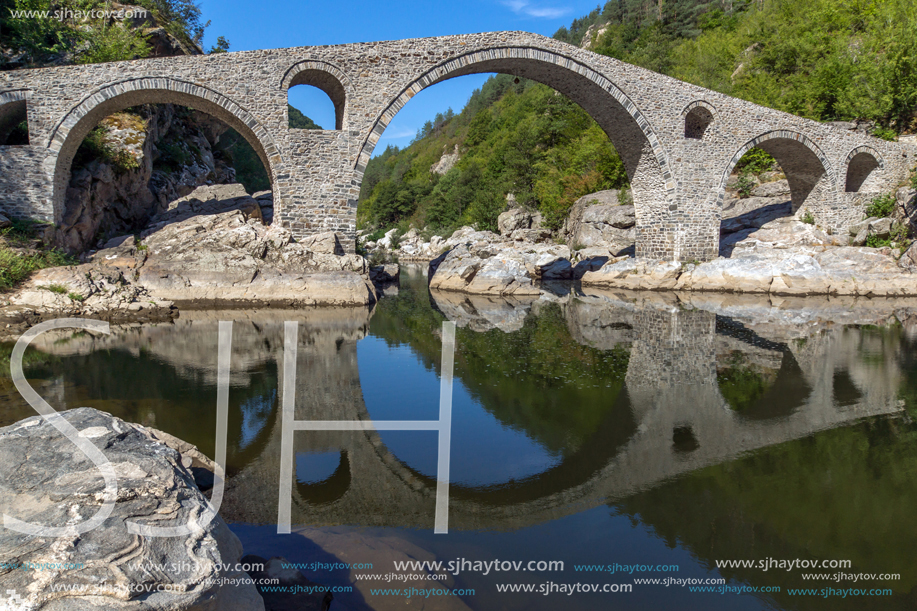 Amazing Reflection of Devil"s Bridge in Arda river and Rhodopes mountain, Kardzhali Region, Bulgaria