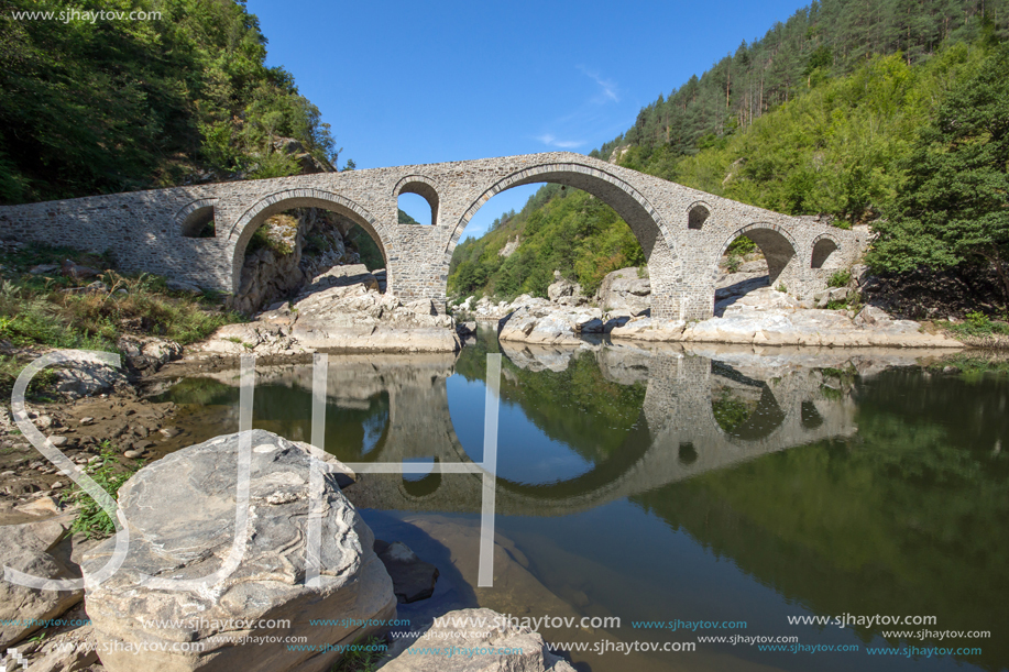 Amazing Reflection of Devil"s Bridge in Arda river and Rhodopes mountain, Kardzhali Region, Bulgaria