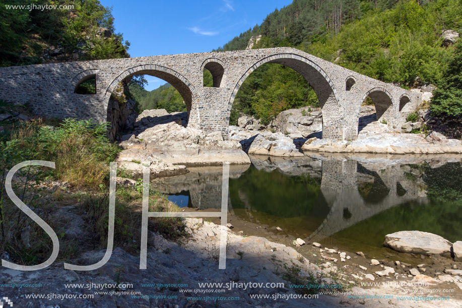 Amazing Reflection of Devil"s Bridge in Arda river and Rhodopes mountain, Kardzhali Region, Bulgaria